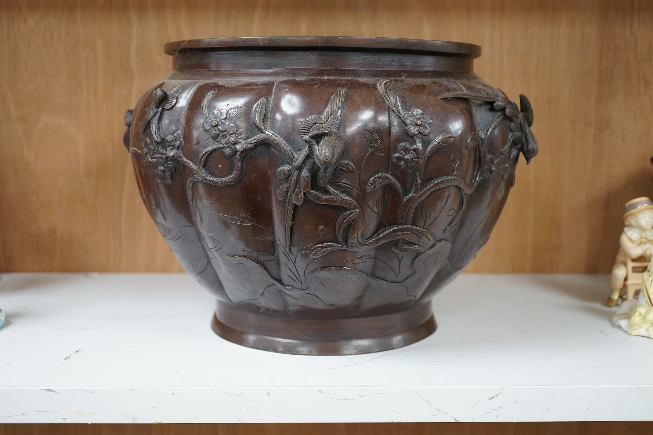 A Japanese late Meiji period bronze jardiniere, 22cm. Condition - fair